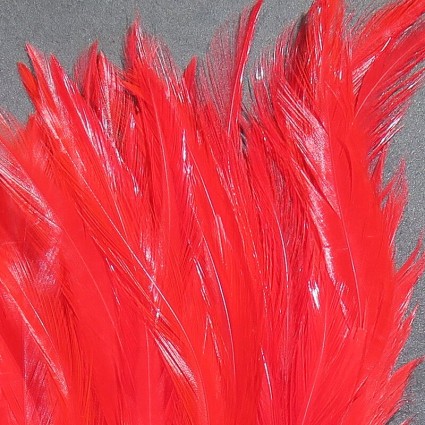 Перо Hareline Strung Chinese Saddle Hackle 5-7'' #310 Red фото 1
